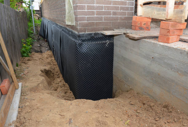 SJ Waterproofing Pros technician performing targeted Waterproofing assessment in Atwood, KS